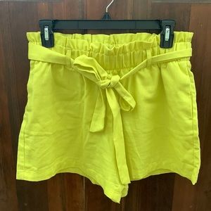 Bright yellow/green shorts